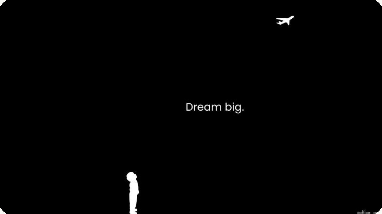 Dream big. A child watching a plane cross a black sky